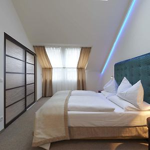 Suite "Deluxe Plus" met een Queen Size Bed
